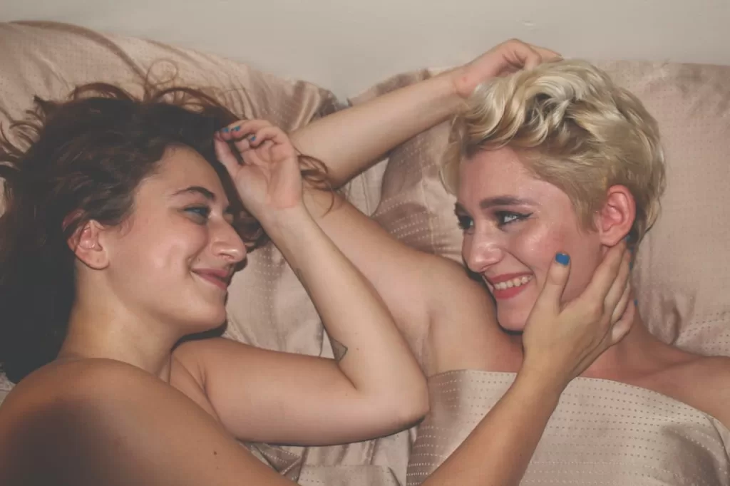 Two lesbians in bed together 